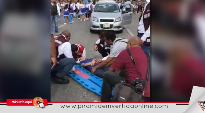 Cae estudiante de tabla acrobática durante desfile