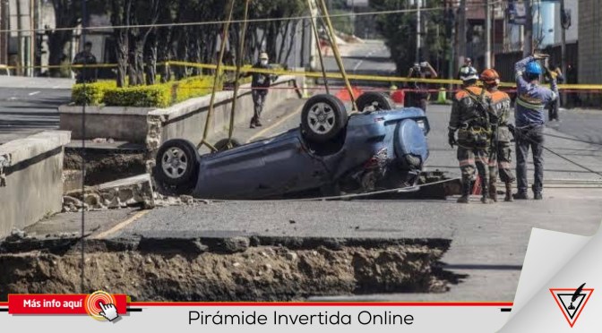 Madre e hija están desaparecidas tras caer a enorme socavón en Guatemala